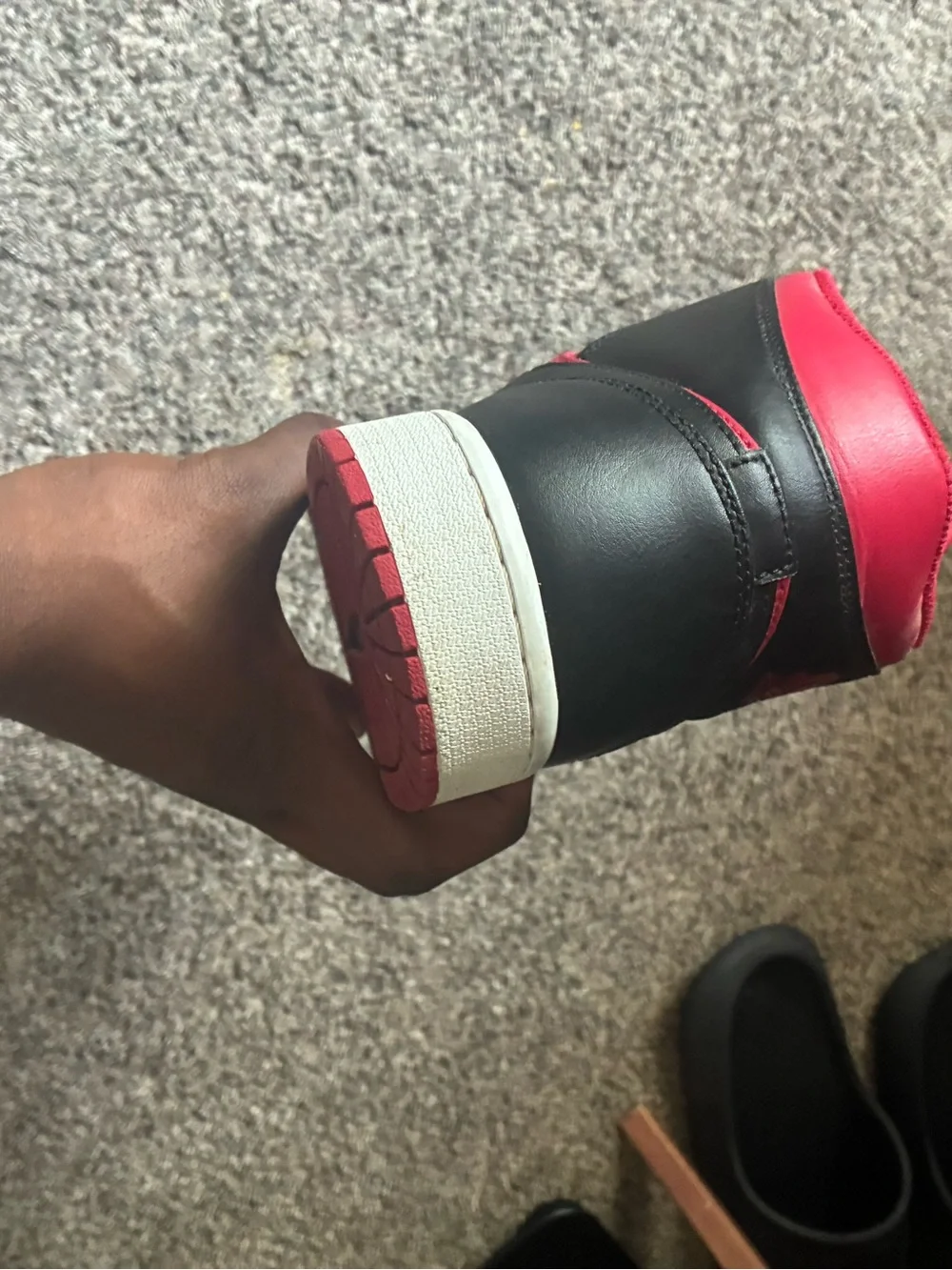 Men's Red and Black Jordan 1s